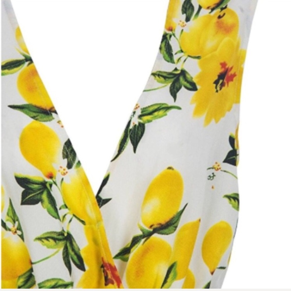  w/tags! Fun and flirty white lemon romper! - Picture 3 of 5