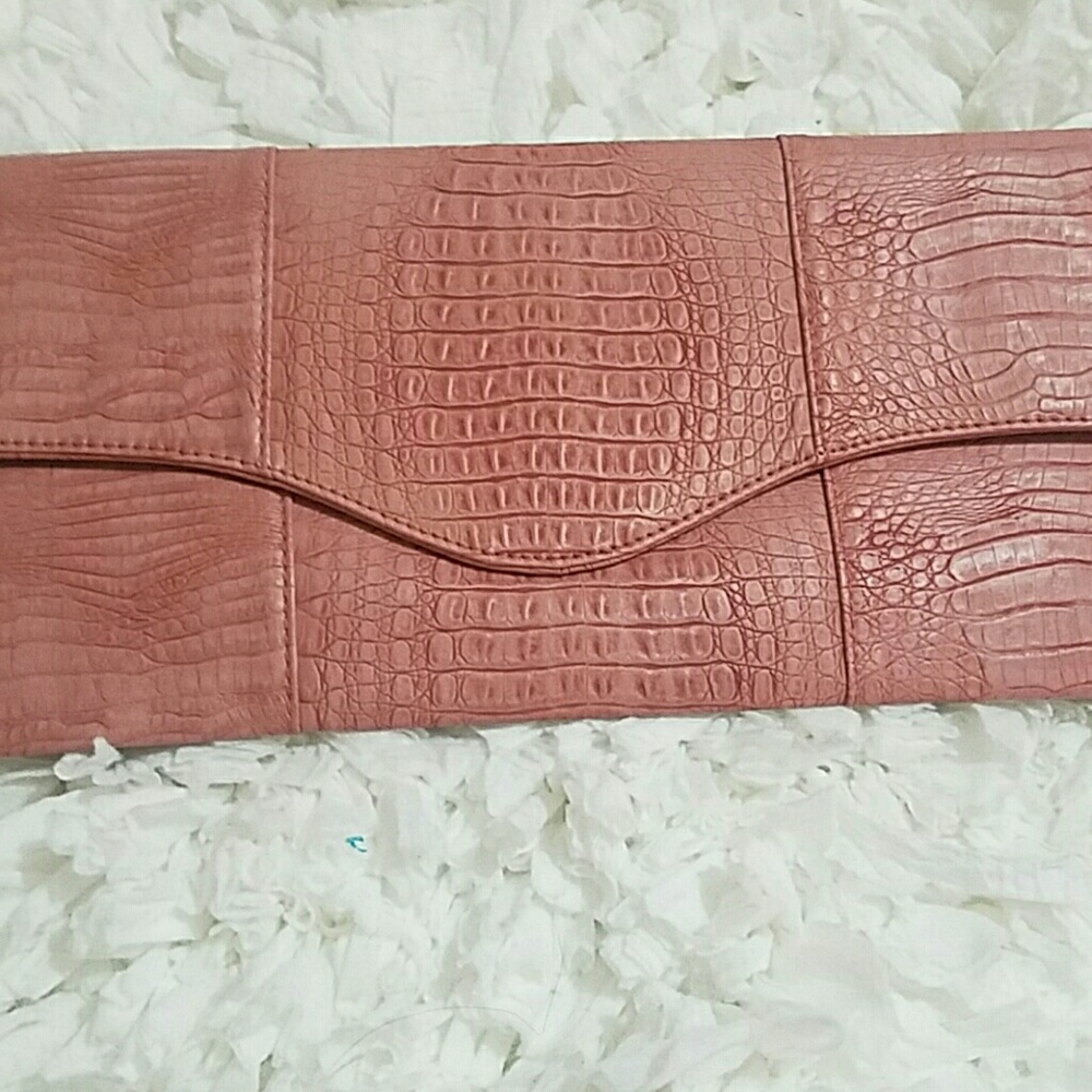 Pink leather clutch