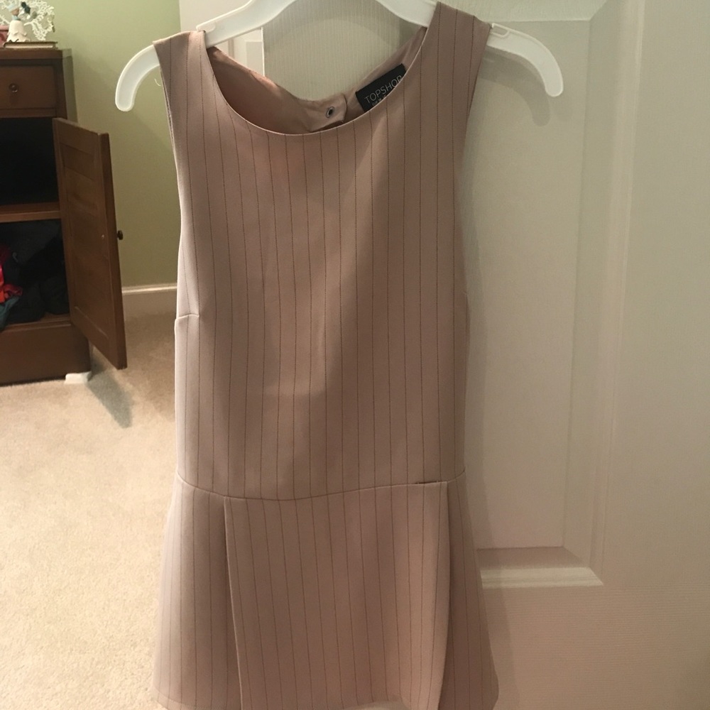 Light pink stripped top with open back and bow