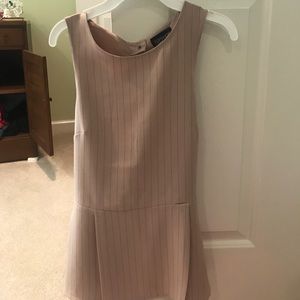 Light pink stripped top with open back and bow