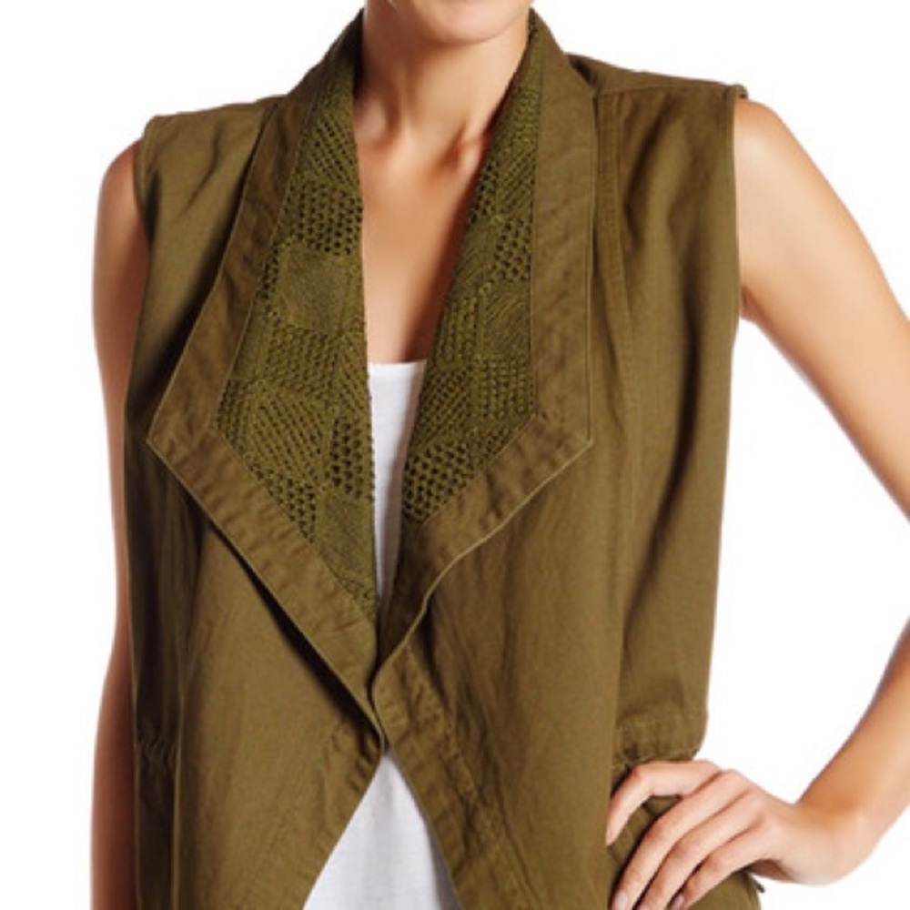 Casual but stylish sleeveless olive colored vest