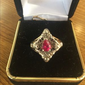 Ruby and diamond gold and silver ring