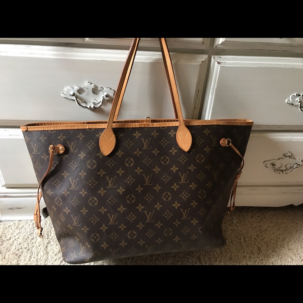 Authentic Louis Vuitton Never full GM