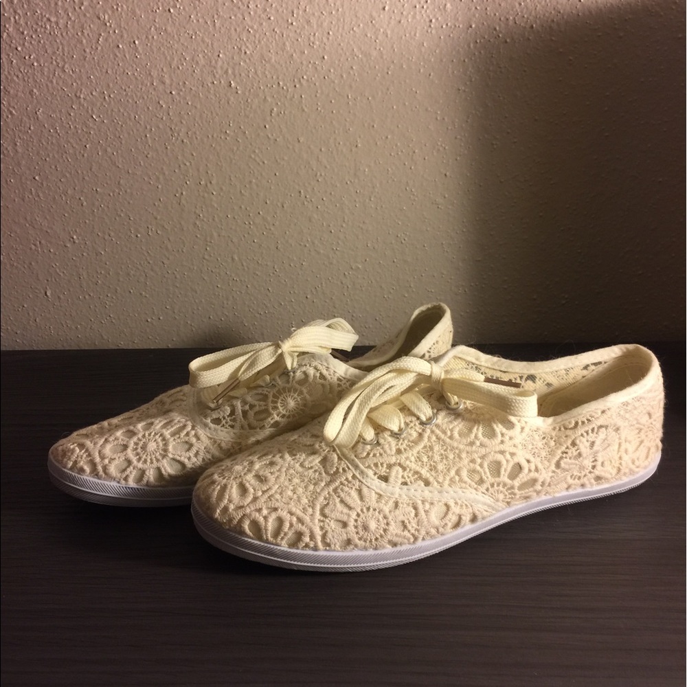 Cream colored lace flats