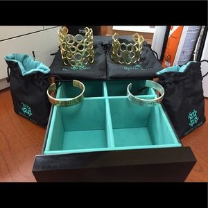 Four rustic cuff bangles plus storage box