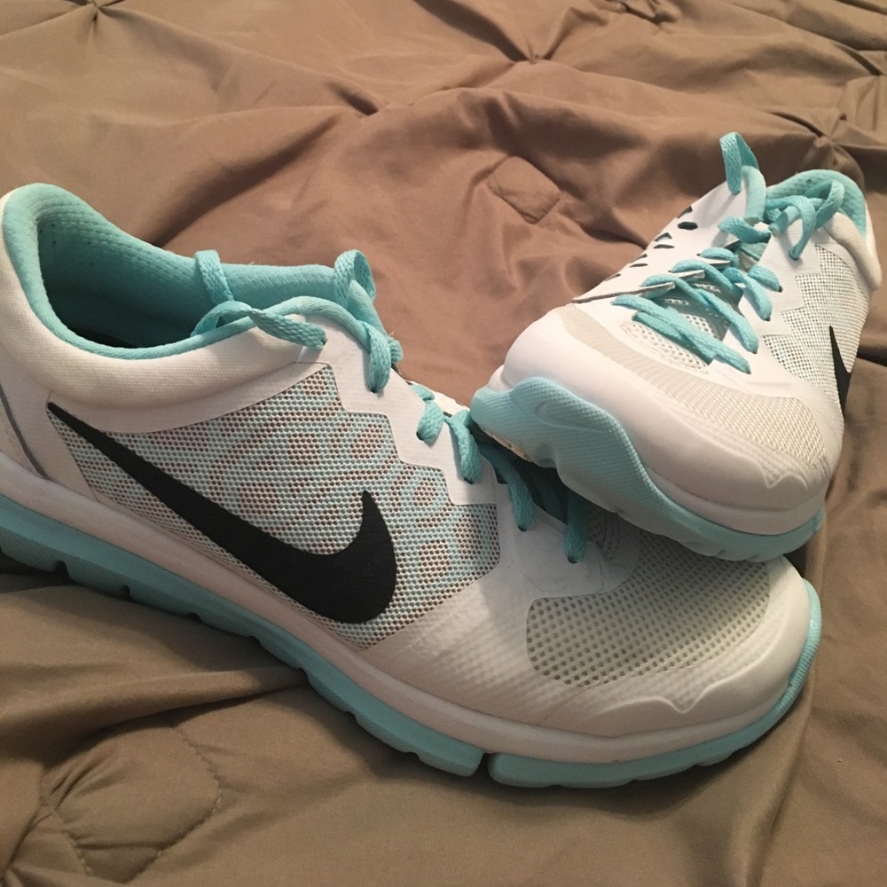 Baby blue and white Nikes