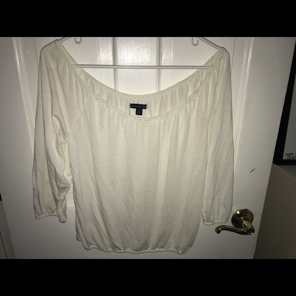 White quarter length sleeve