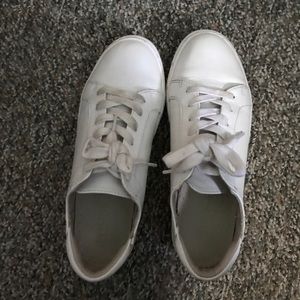 lightly worn white sneakers