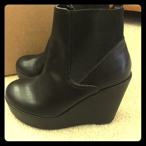 Black wedge boots