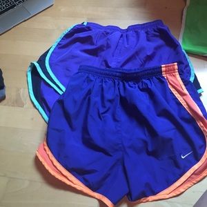 2 pairs of nike tempo running shorts
