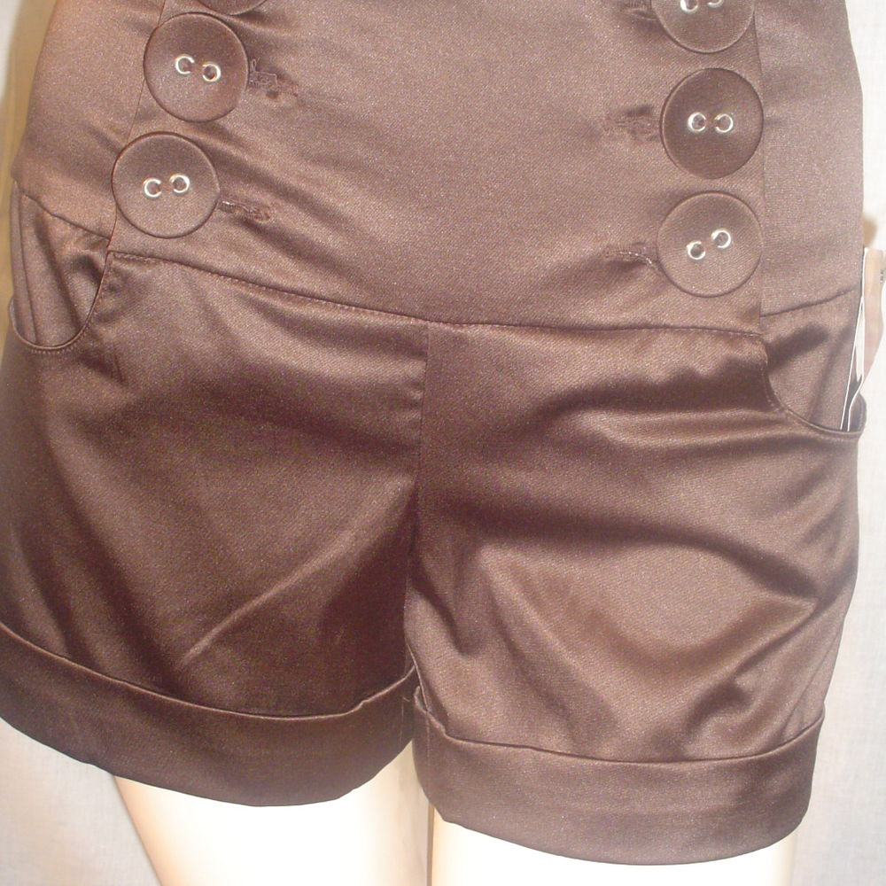 Brown High Waisted Double Button Shorts cuffed.