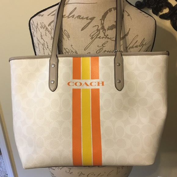 Coach Handbags - Used Coach Orange/Yellow varsity stripe