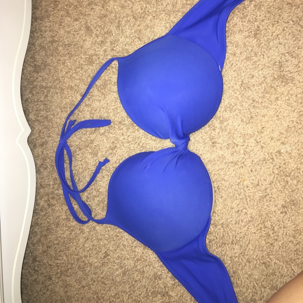 Blue bathing suit top and bathing suit bottom