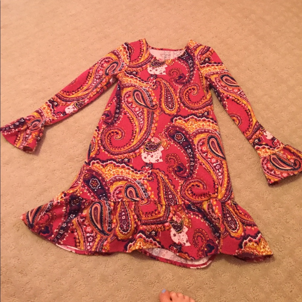 A very colorful and designed dress