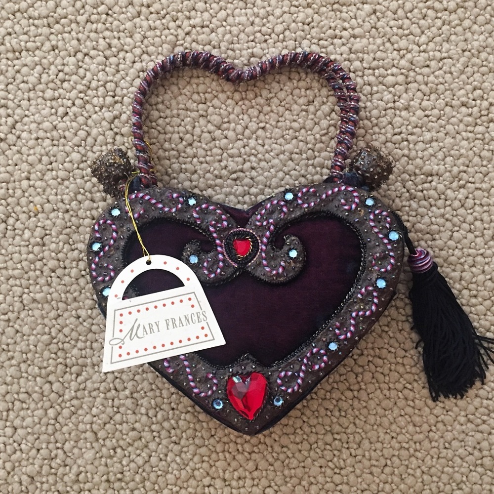 Mary Francis heart clutch
