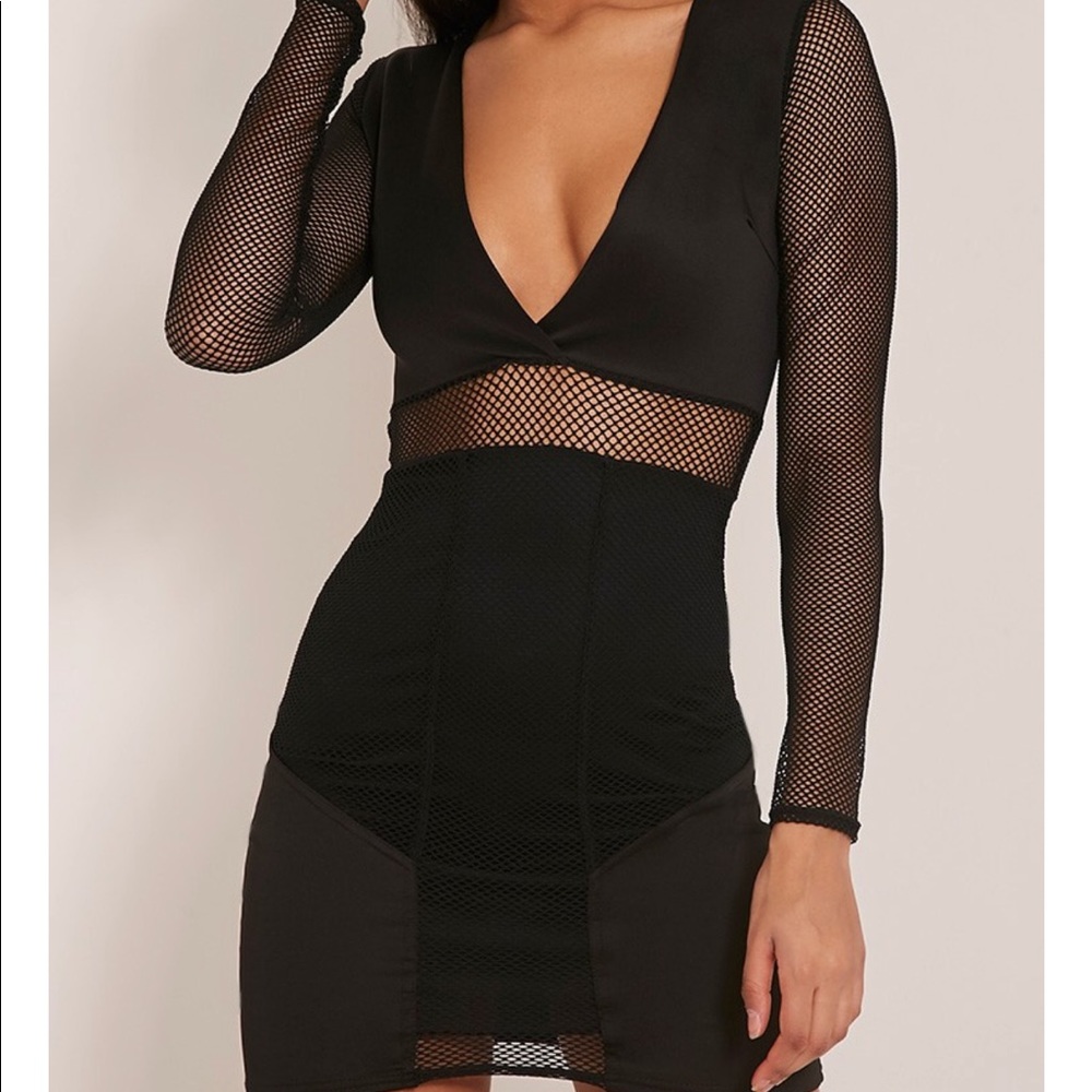 NWT, Sexy bodycon dress with fishnet detail!