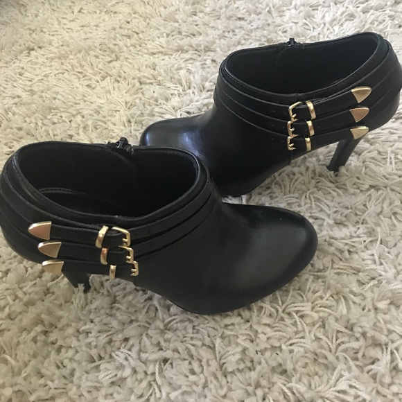 Black ankle booties with beautiful gold hardware. - Picture 4 of 6