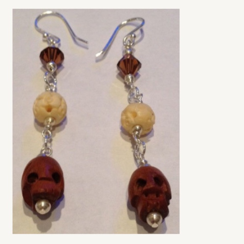 one of a kind skull earrings