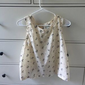 Cream colored top w/ bow design
