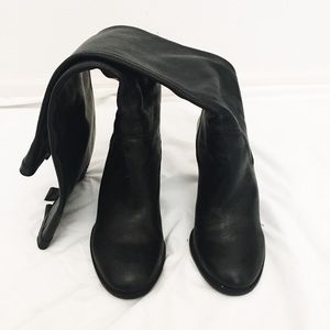 Over the knee black leather boots