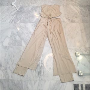 Cream jumpsuit with overlay