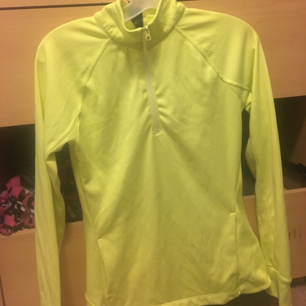 A lime green workout jacket with zipper