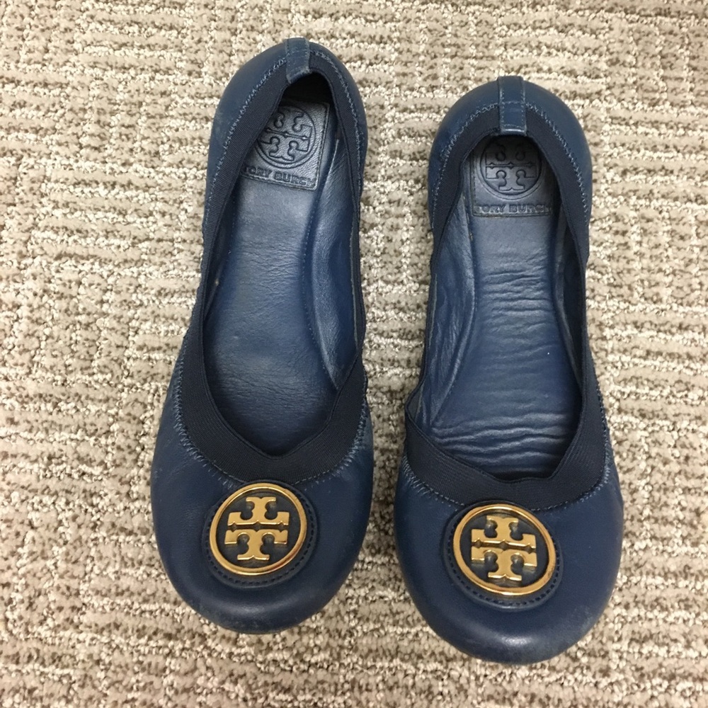 blue flats with gold detail