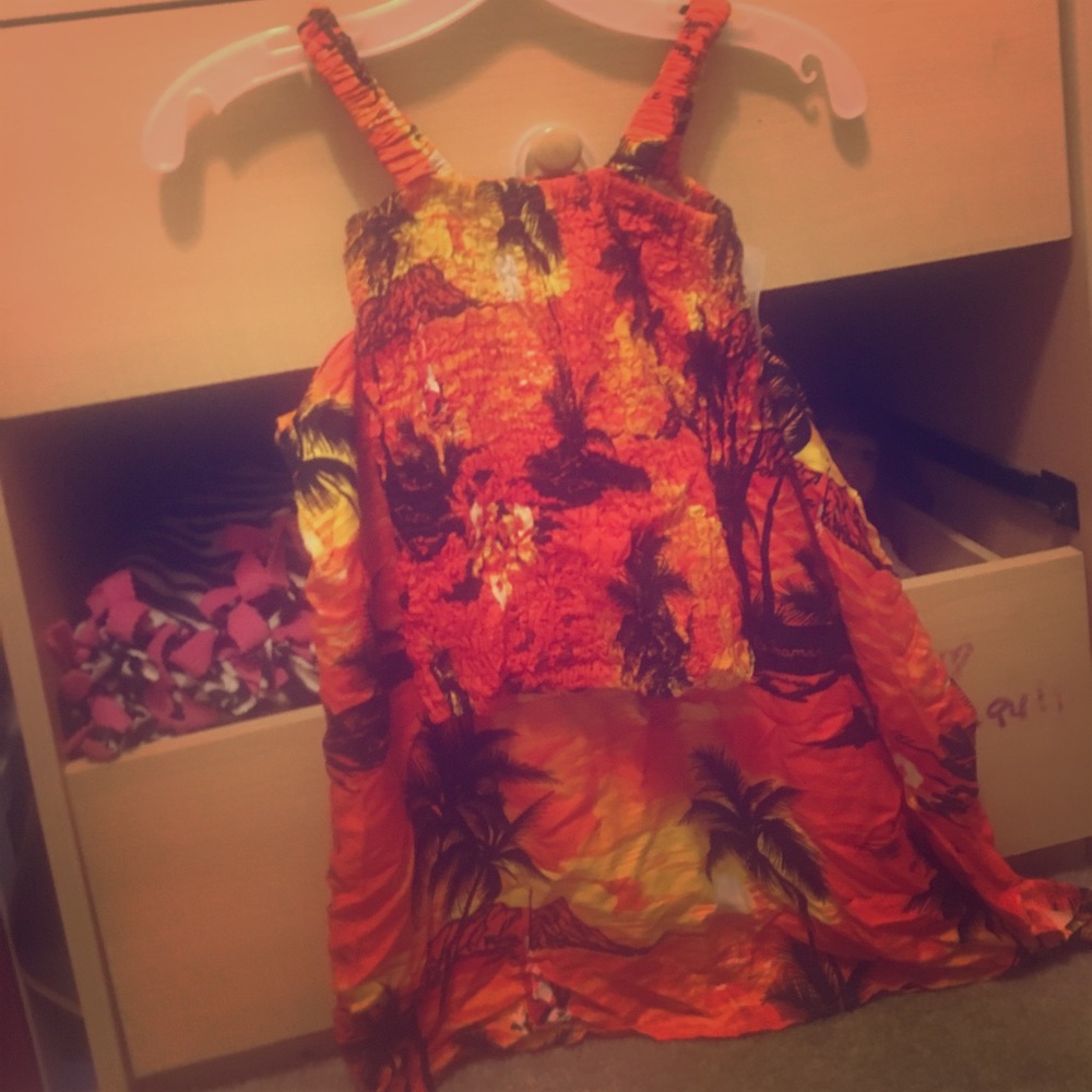 A 2- piece shirt/ skirt