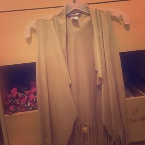 A tan/neutral cardigan