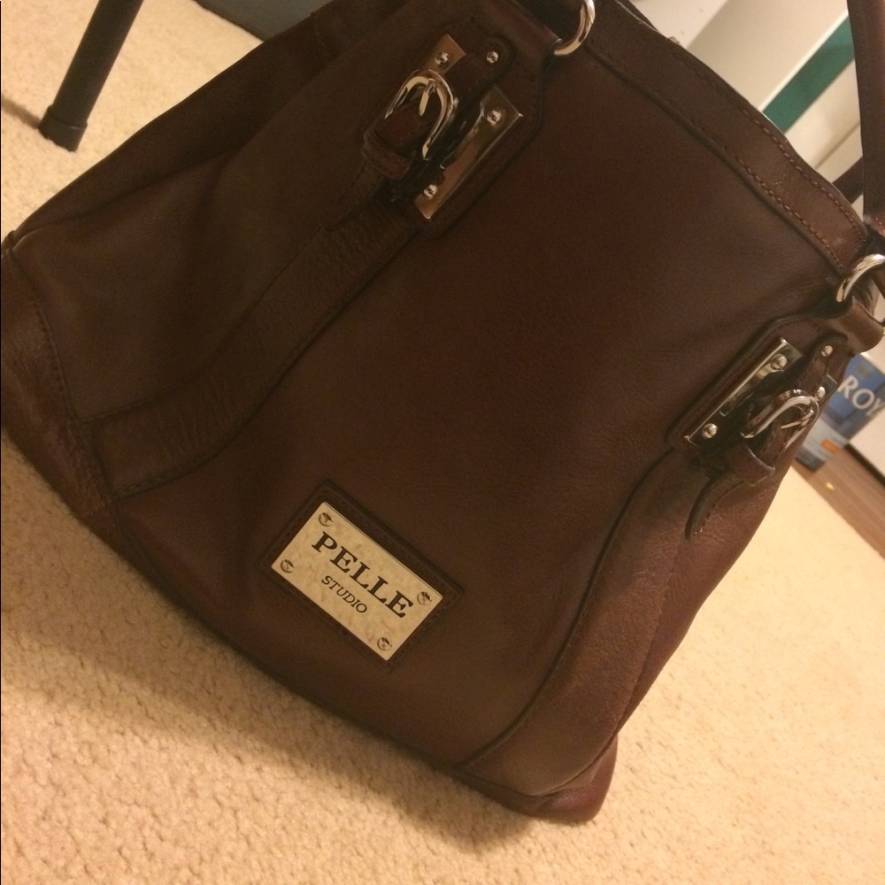 A genuine brown leather, medium sized purse