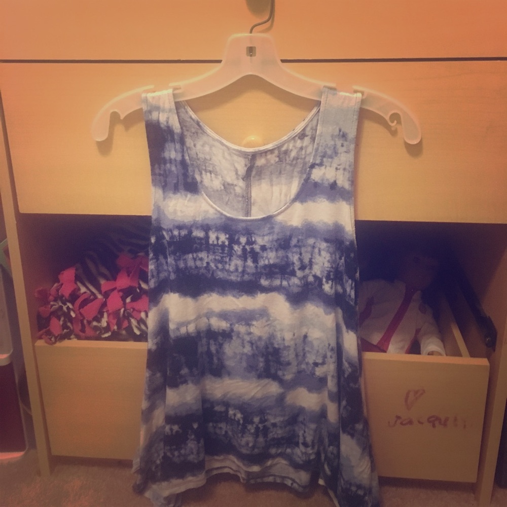 A light blue flowing shirt