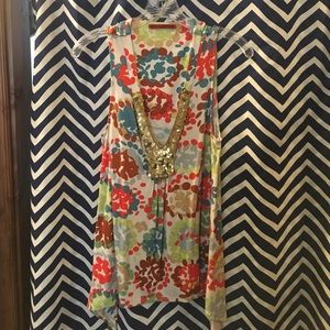 Multi color velvet top with gold embellishments.