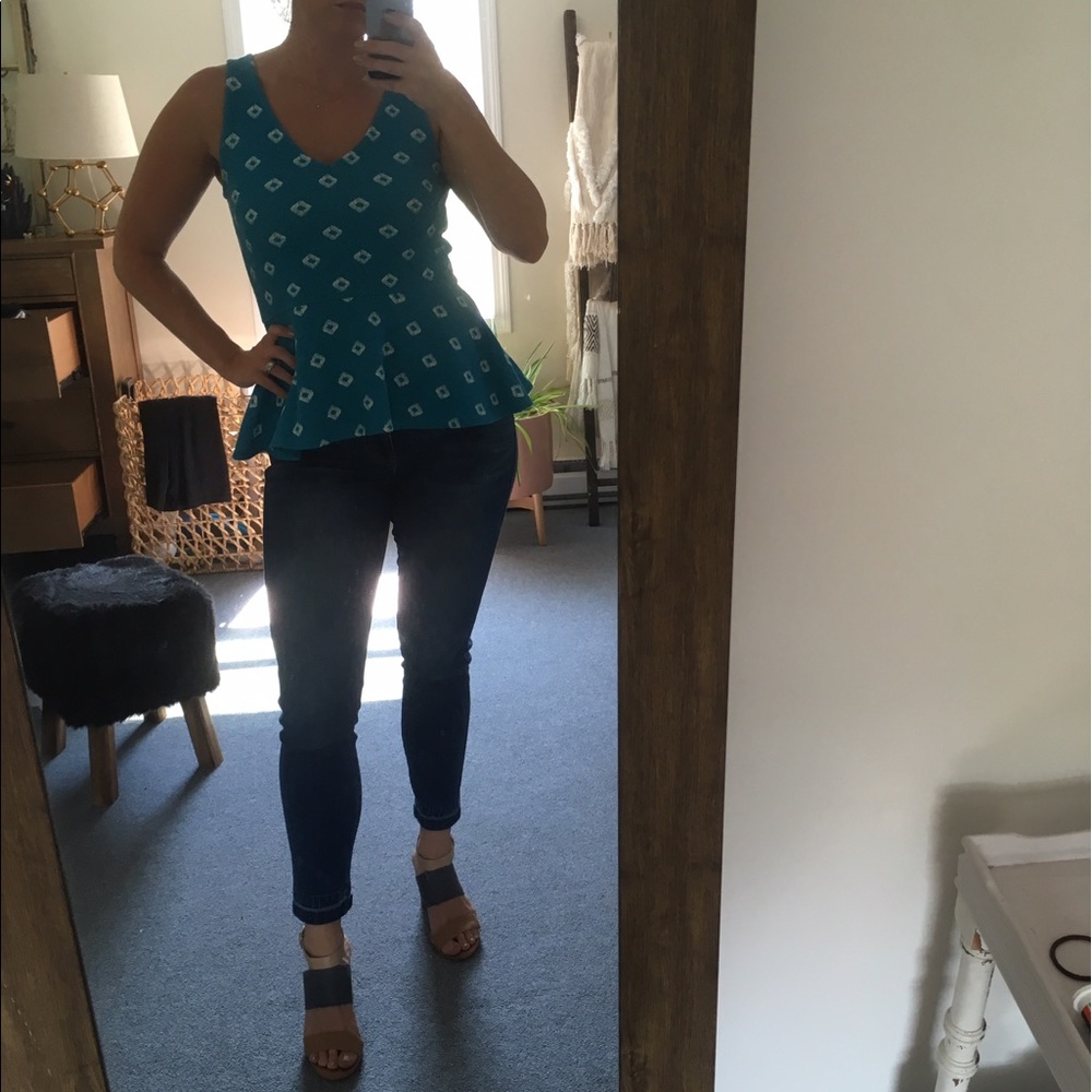 Peplum top in vivid blue with white pattern