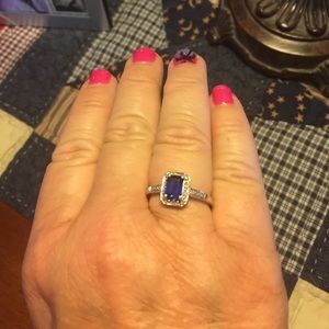 Lab created blue sapphire and diamond ring.