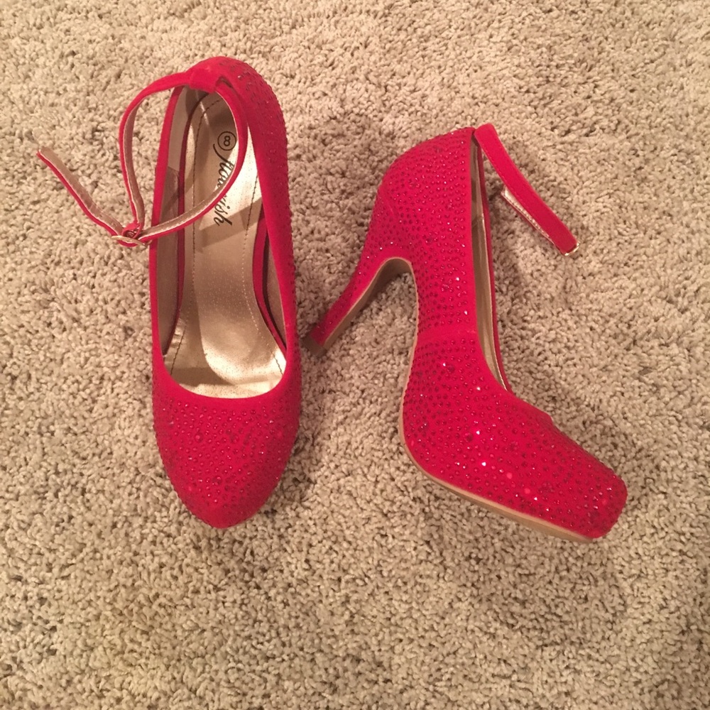 Red rhinestoned heels