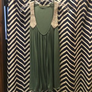 Dressy teal tank with silver embellished straps.