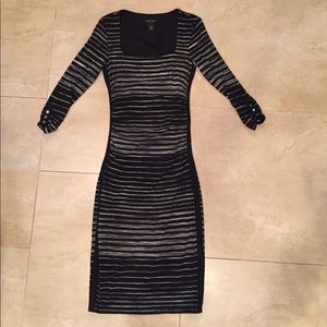 Black and white WH BM form-fitting dress.