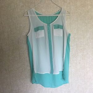 White and teal blouse
