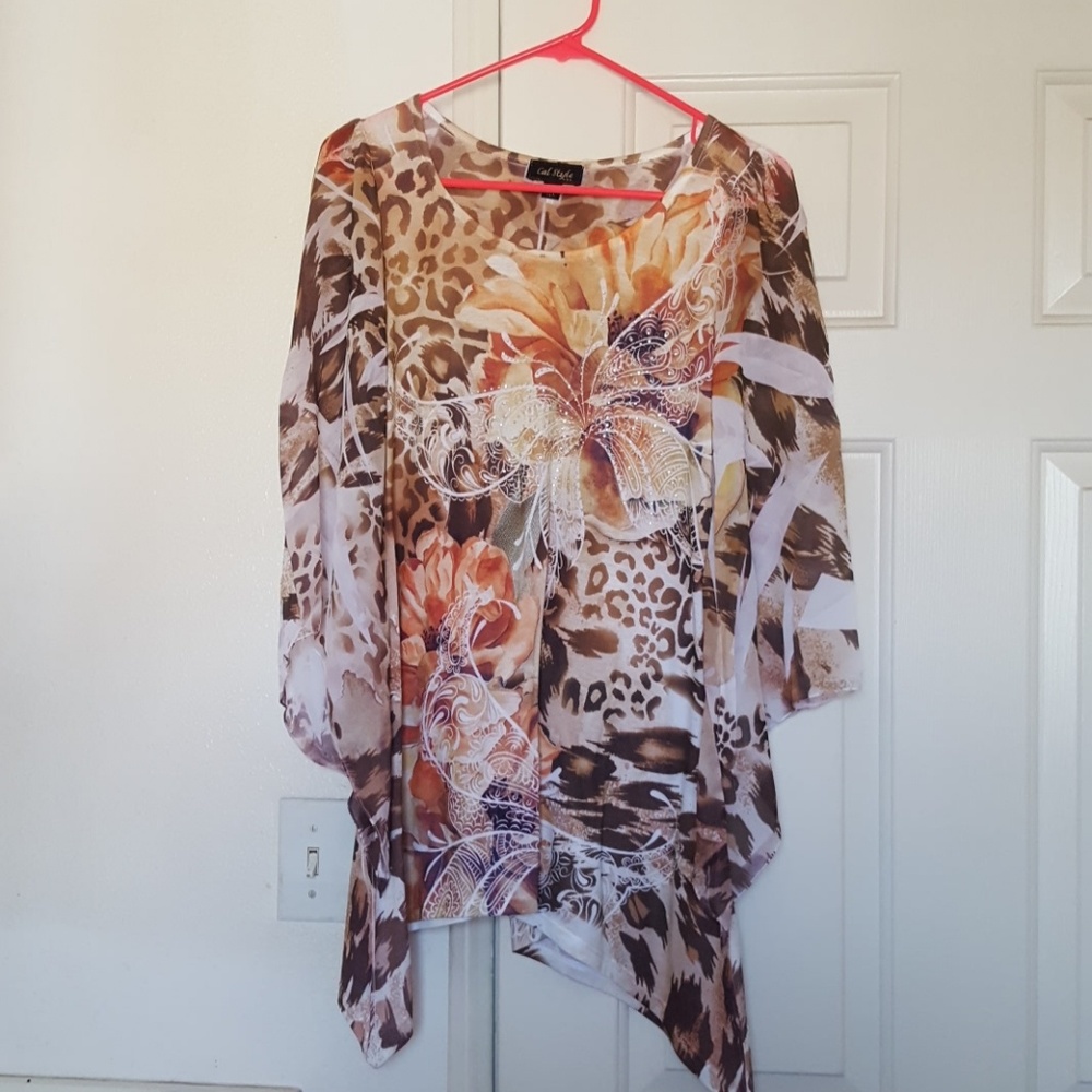 Tunic with butterfly on it