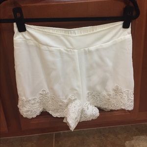 White lace shorts
