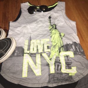 Yellow and grey graphic tee.