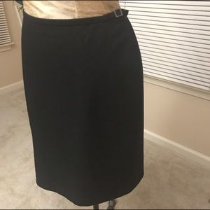Ann taylor black side buckle, straight skirt.