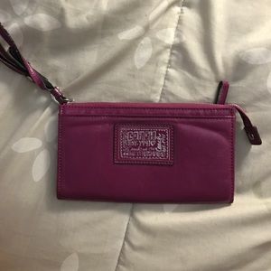 Purple Coach wristlet