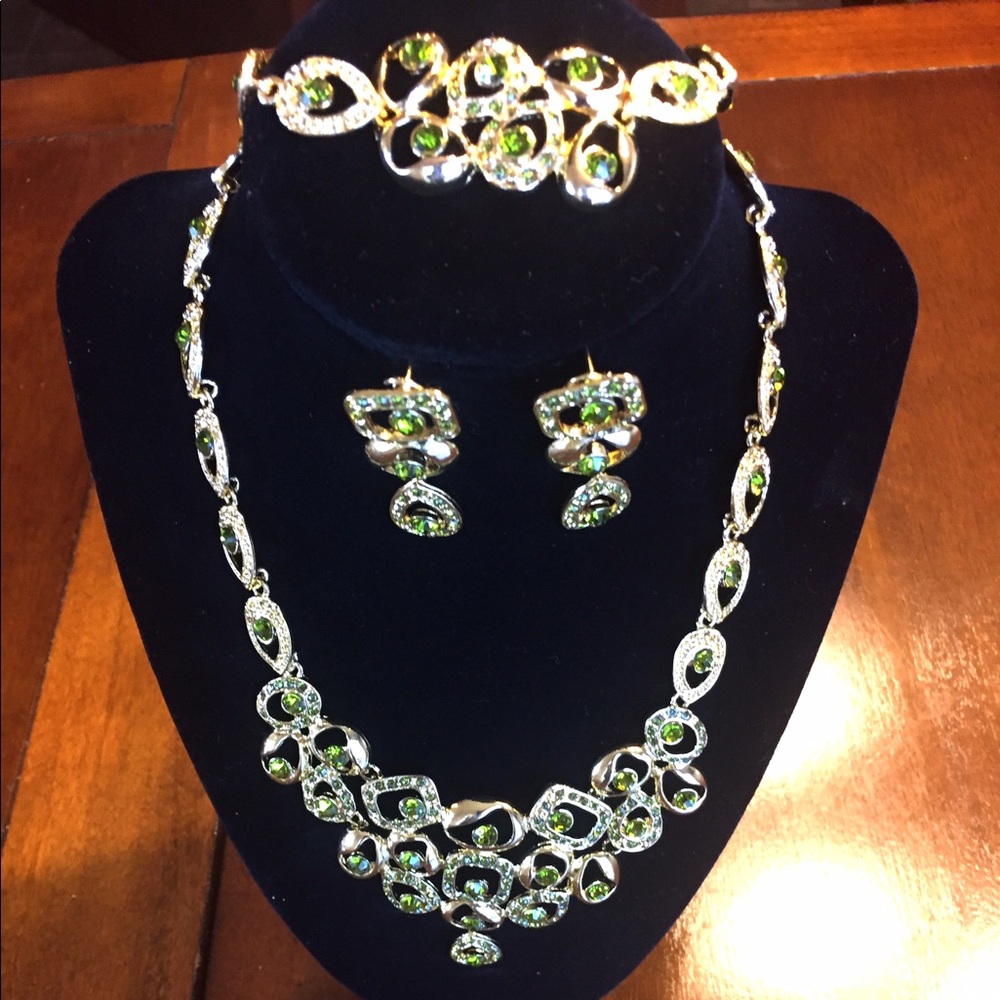 Gold necklace and earrings jewelry set.