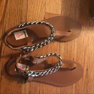 Sandal with chain around