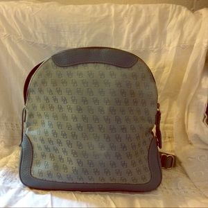 Dooney and Bourke blue leather backpack purse.