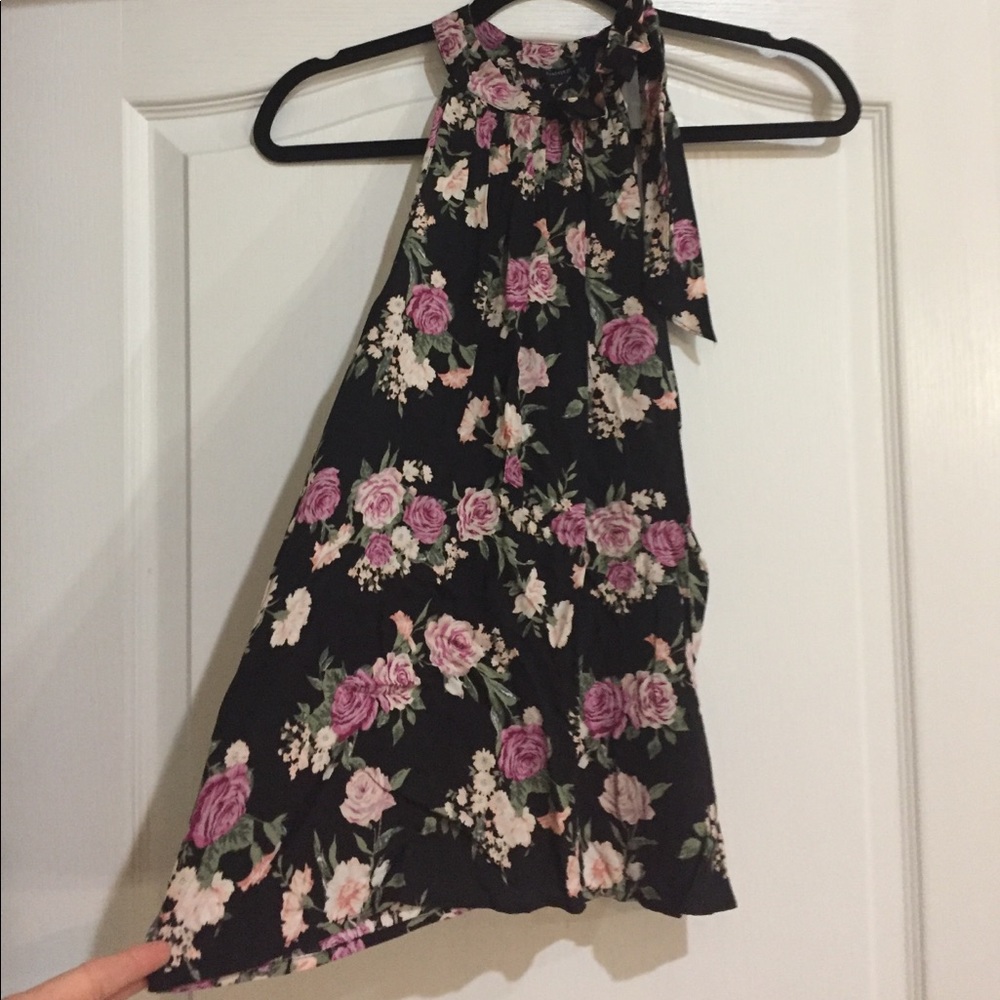 High neck blouse with a bow.