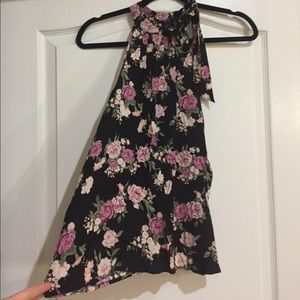 High neck blouse with a bow.