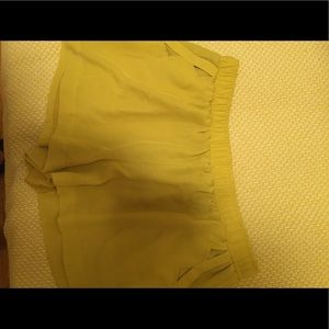 BCBG mustard yellow shorts with pocket detail sz L