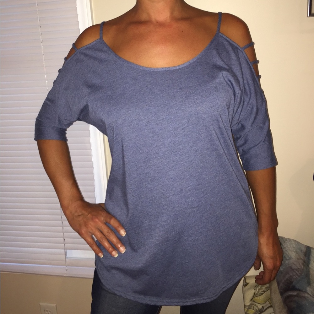 Venus:  smallBlue cutout sleeve top.